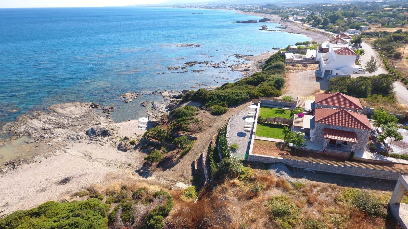 Aerial photo of the Kiotari area with Alisahni Beachfront Villas overlooking the shoreline in Rhodes.