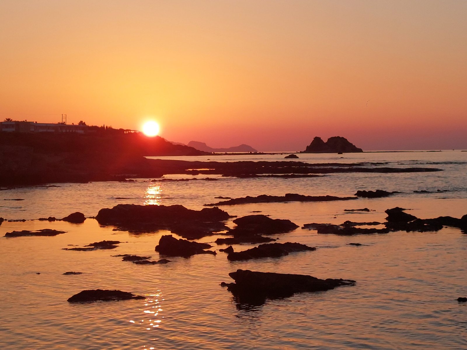 Sunrise view of Kiotari Beach as seen from Alisahni Beachfront Villas in Rhodes.