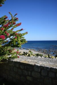 Beach view from the edge of the garden at Alisahni Villas in Kiotari, Rhodes.